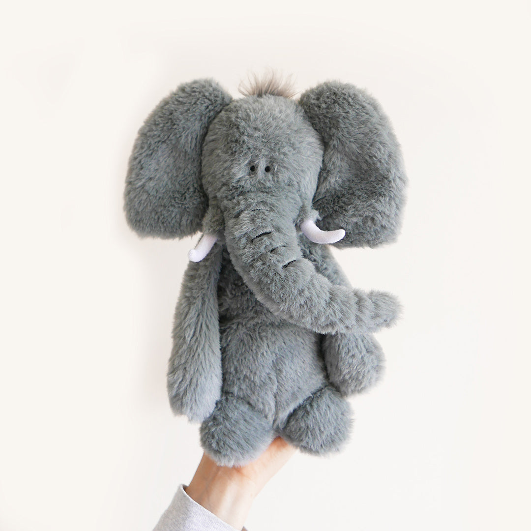 Elephant soft toy on white background