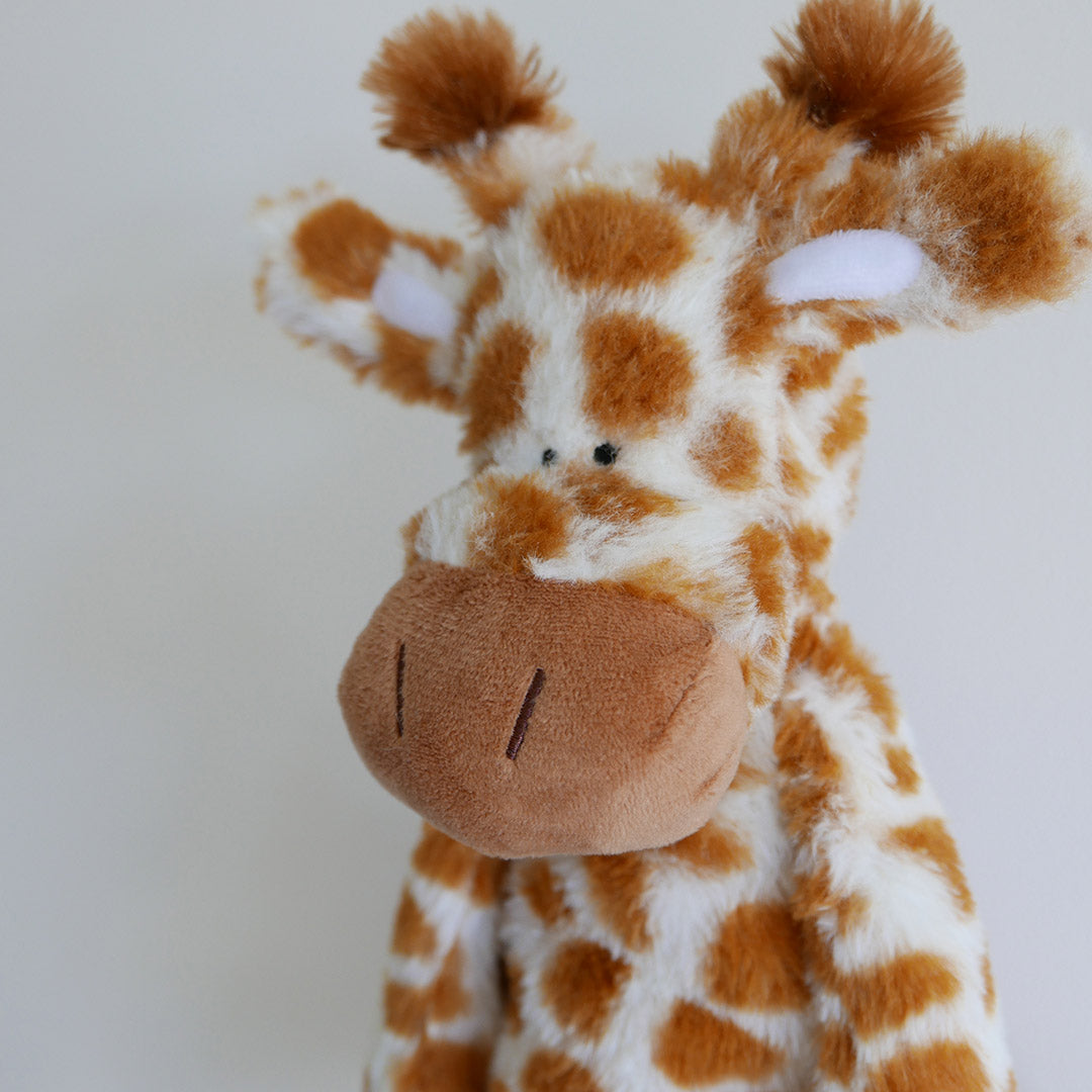 Close up of plush toy fabrics used on giraffe soft toy